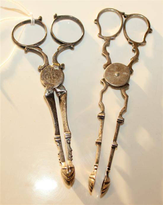 Two pairs of Georgian silver sugar nips